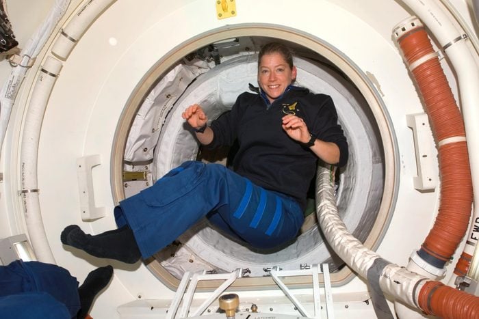 Astronaut Pam Melroy, STS-120 commander, floats in the Orbiter Docking Compartment (ODS) after hatch opening between the International Space Station and Space Shuttle Discovery.