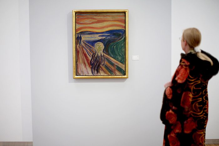 A Visitor Eyes Edvard Munch's Painting 'The Scream' on Display at the Exhibiton 'Scream and Madonna - Revisited' at the Munch Museum in Oslo Norway 23 May 2088 Munch's Works of Art 'The Scream' and 'Madonna' Were Returned to the Munch Museum After Their Theft From the Museum in August 2004 the Paintings Have Been Restored and Conserved and Are Now Back on Display in the Exhibition That Runs Until 26 September 2008 Norway Oslo