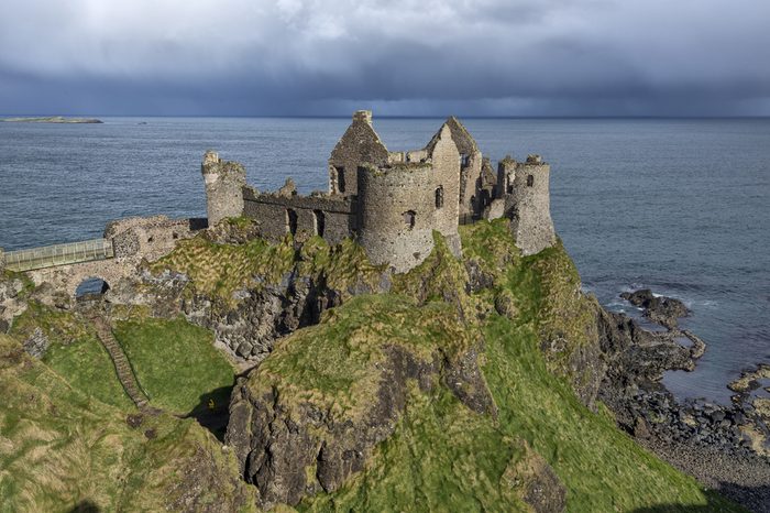 Dunluce Castle, Northern Ireland, at the edge of a cliff