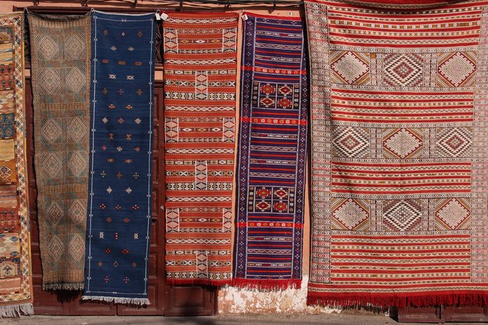Morocco Marrakesh Colorful Berber carpets for sale hanging in the Jemaa El Fna Square