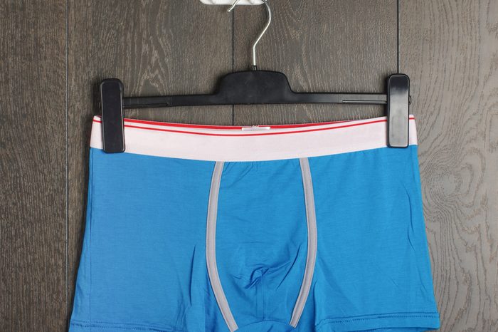 Sexy blue male underwear on the hanger