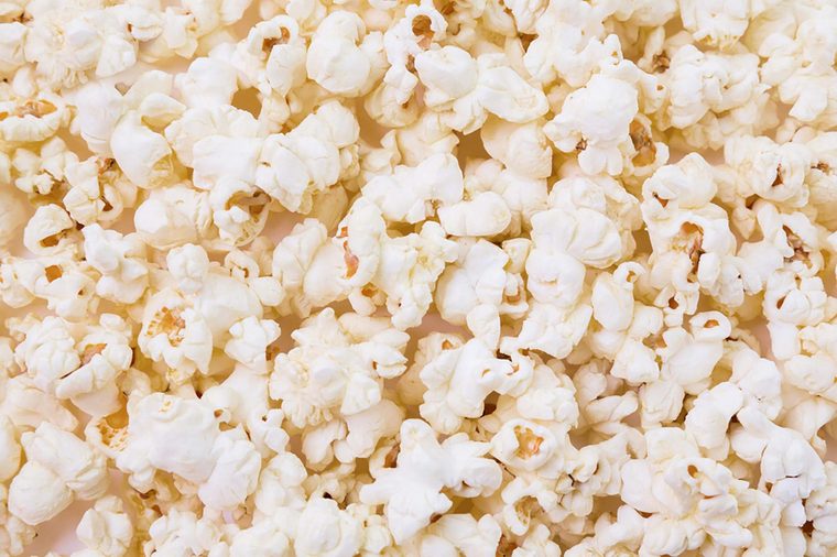 Bowl of popcorn isolated on white background