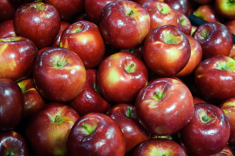 Background with delicious, shiny red apples at the Farmer's Market