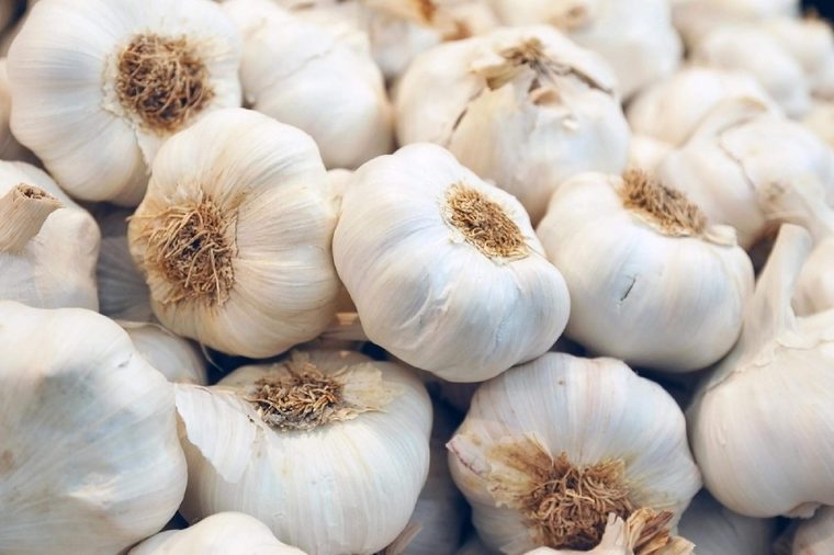 close up of garlic on market stand