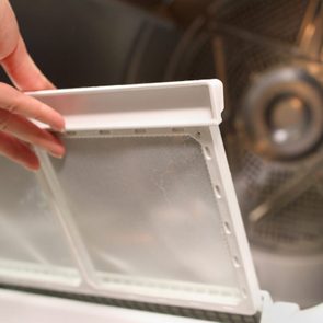 replacing the screen in the lint trap of a clothes dryer