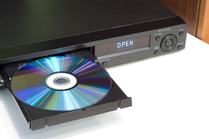 DVD player with an open tray, white background