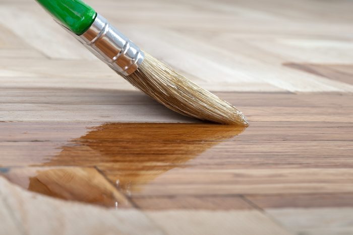 Varnish brush strokes on a wooden floor