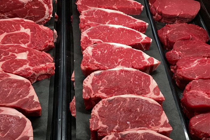 Strip steaks in a butcher's window