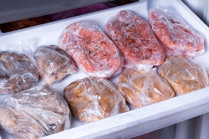 Frozen pork neck chops meat steakin the freezer. Frozen food
