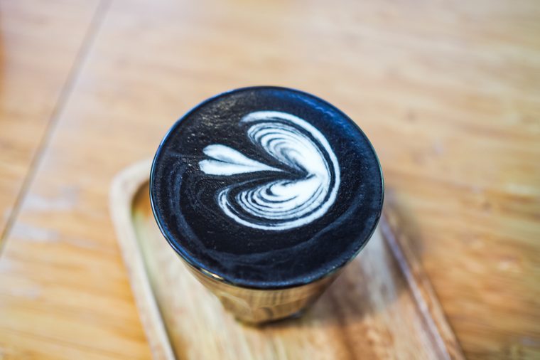 Charcoal coffee on wooden table