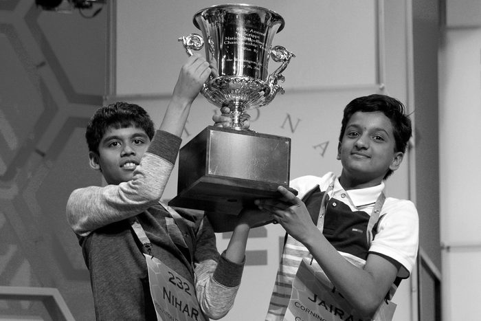 Jairam Hathwar, Nihar Janga Nihar Janga, 11, of Austin, Texas, and Jairam Hathwar, 13, of Painted Post, N.Y., hold up the trophy after being named co-champions at the 2016 National Spelling Bee, in National Harbor, Md., on