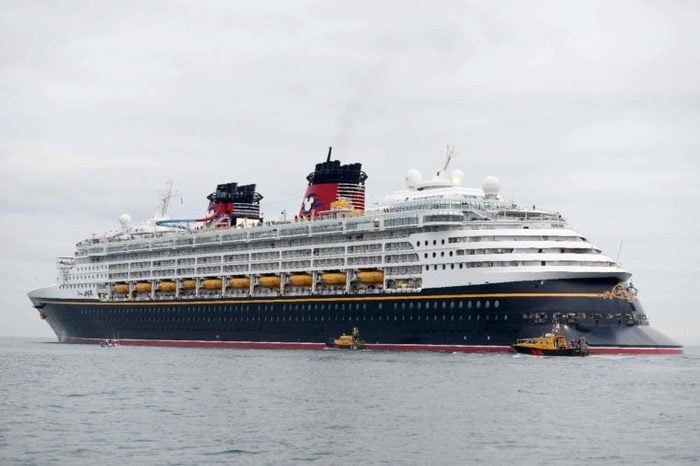 Disney Magic cruise ship leaves Portland Port, Dorset, UK