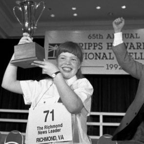 Amanda Goad, Dan Thomasson Amanda Goad, 13, of Richmond, Va., holds up her trophy after spelling 