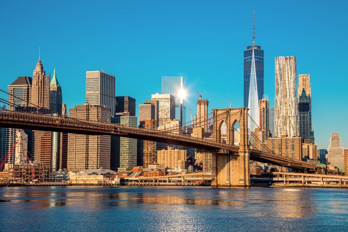 Famous Skyline of downtown New York, Brooklin Bridge and Manhattan at the early morning sun light , New York City, USA