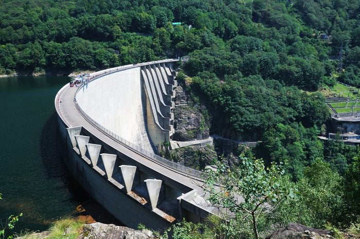 The Contra Dam is a concrete slender arch dam in the Swiss Alps. It supports a 105 MW power station. The dam creates a water reservoir Lago di Vogorno. It became a popular bungee jumping venue.