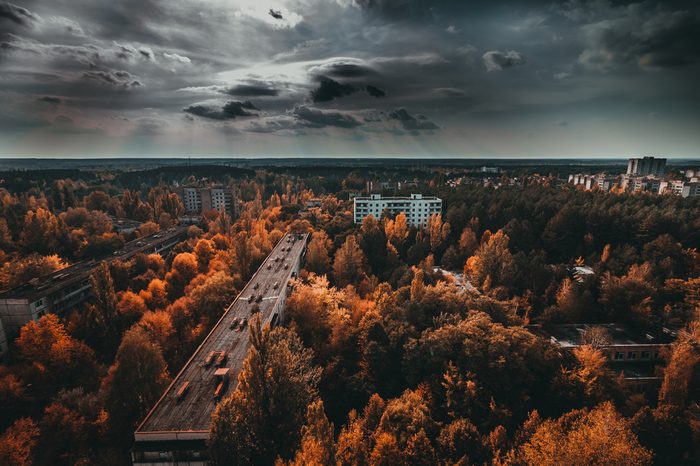 Chernobyl exclusion zone. Ruins of abandoned Pripyat city. Autumn in zone of exclusion. Zone of high radioactivity. Panoramic view of ghost town. Ruins of buildings. Chernobyl. Ukraine.