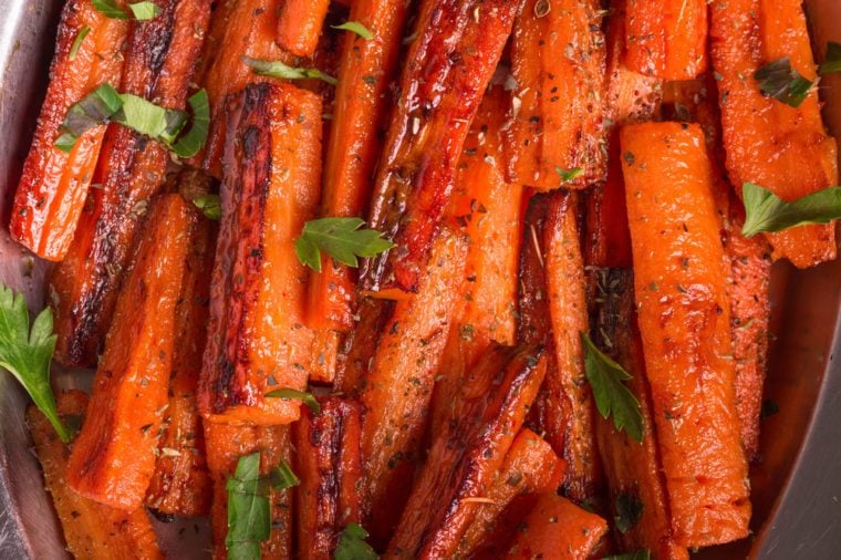 Roasted Carrots with fresh Parsley. Caramelized Carrots. A healthy carrot dish that is rich of vitamin A.