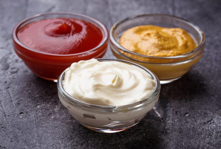 Set of different sauces: mustard, ketchup, mayonnaise. Selective focus