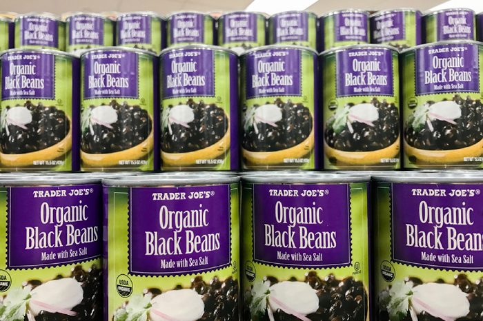 New York, February 14, 2017: Cans of Organic Black Beans are stacked on a shelf in a Trader Joe's store.
