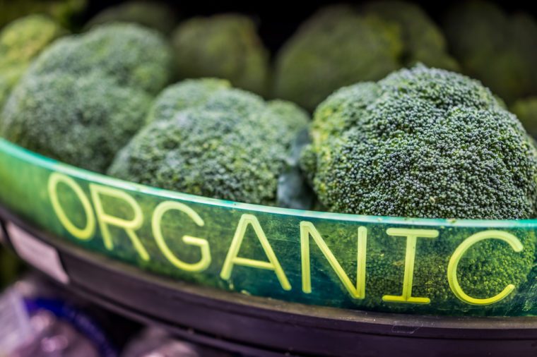 Broccoli display in store with organic sign