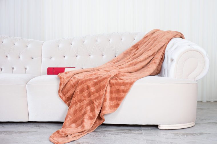 wellsoft throw blanket on the white sofa