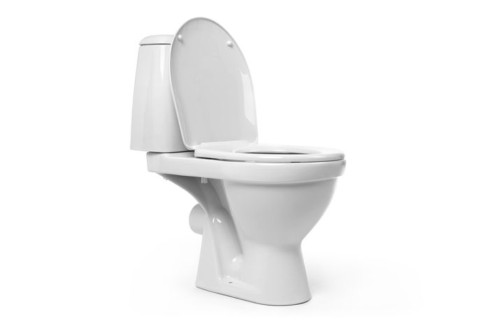 Open toilet bowl isolated on white background. File contains a path to isolation.