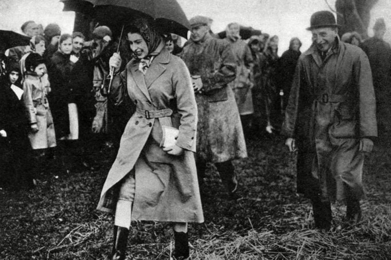 The Queen Well Protected From the Rain Walks Across A Muddy Field to Watch the Dressage at the Badminton Horse Trials 1959 1959