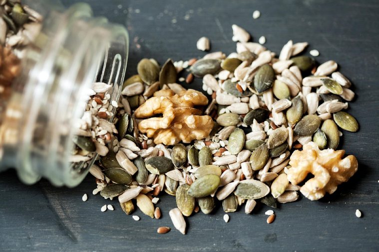 Various seeds , nuts seeds , pumpkin seeds and varies in glass jar