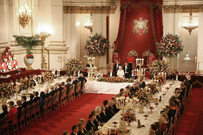 Queen Elizabeth II and President of Turkey Abdullah Gul flanked by the Princess Anne (top table, left) and Prince Philip (top table, right) as they attend a State Banquet at Buckingham Palace