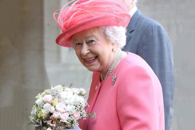Queen Elizabeth II smiles after she started the London Marathon from Windsor Castle
