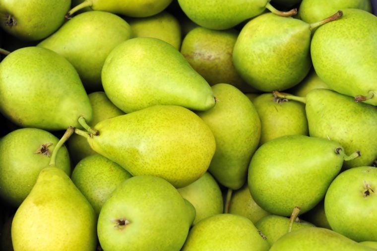 Green pears at a famers market in France