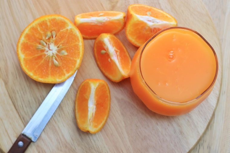 orange juice, fresh orange, on chopping board, Top view, loseup fruit, texture, background
