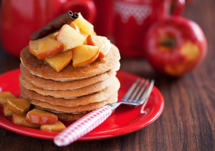 Pancakes with cinnamon and caramelized apples, selective focus