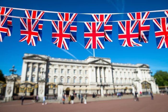 Union Jack flag bunting decorates the Mall in front of Buckingham Palace ahead of the Royal Wedding in London, England.