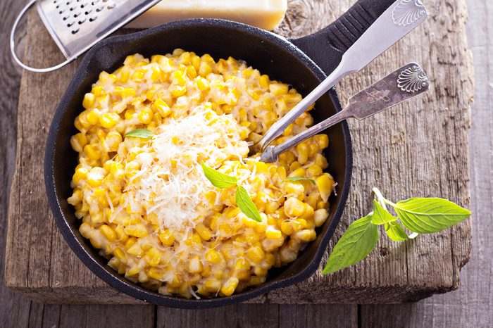 Creamy corn with cream and grated parmesan