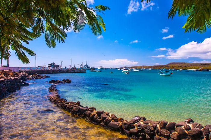 The bay with a dock in the Galapagos Islands. Pacific Ocean. Ecuador. The Galapagos Islands. Isla San Cristobal Island