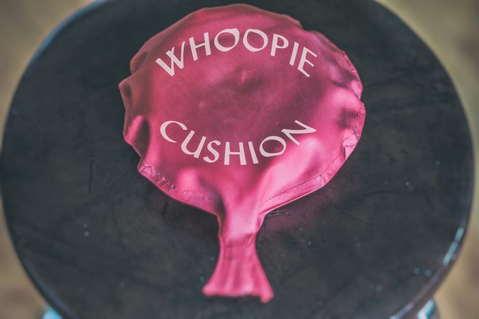 Whoopie Cushion. Whoopie cushion on a chair with the words whoopie cushion printed on it.