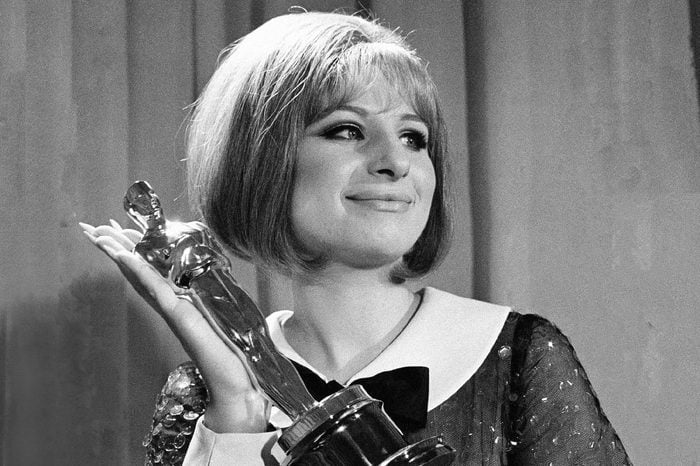 In her very first movie Barbra Streisand won Oscar for her performance in "Funny Girl" in Hollywood, Los Angeles, . She and Katharine Hepburn were named the year's best actresses in a rare tie. Miss Hepburn was honored for her performances in "The Lion in Winter