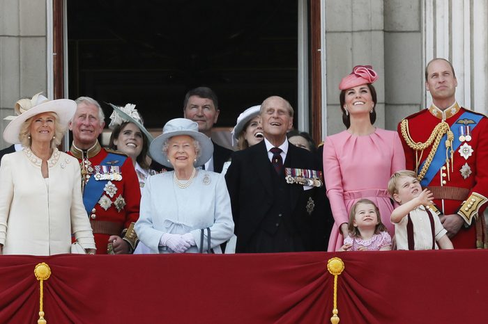 Members of Britain's Royal family from left, Camilla, Camilla Duchess of Cornwall, Prince Charles, Princess Eugenie, Queen Elizabeth II, background Tim Laurence, Princess Beatrice, Prince Philip, Kate, Catherine Duchess of Cambridge, Princess Charlotte, Prince George and Prince William watch a fly past as they appear on the balcony of Buckingham Palace, after attending the annual Trooping the Colour Ceremony in London