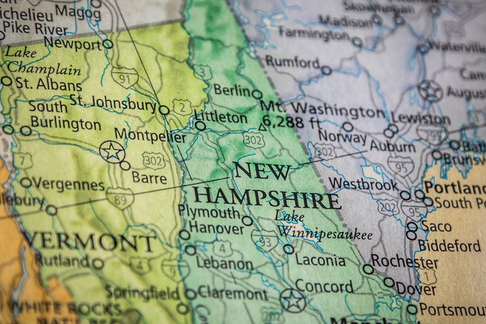Closeup Selective Focus Of New Hampshire State On A Geographical And Political State Map Of The USA.