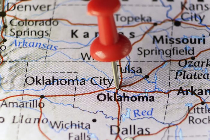 Red pin on Oklahoma city, Oklahoma, USA. Copy space available.