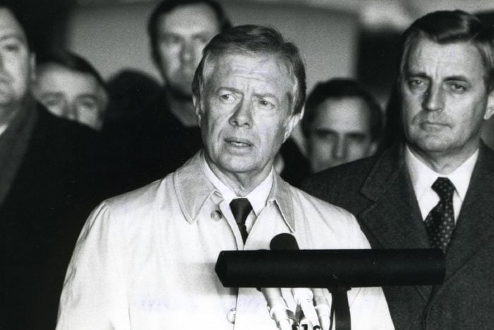 Rhein-main Air Base, West Germany, January 1981 - The 52 Freed Hostages, After Their Release From Iran, And Former Vice-president Walter Mondale Listen As Former President Jimmy Carter Speaks To A Crowd