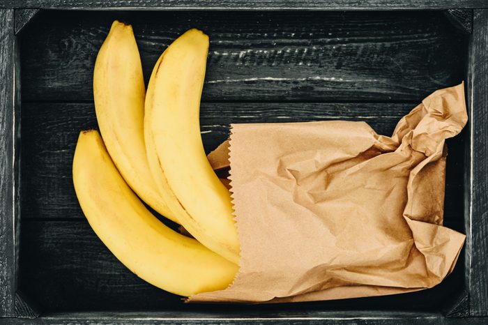 top view of bananas in shopping paper bag
