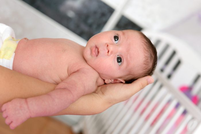 Closeup portrait of newborn baby. Cute baby