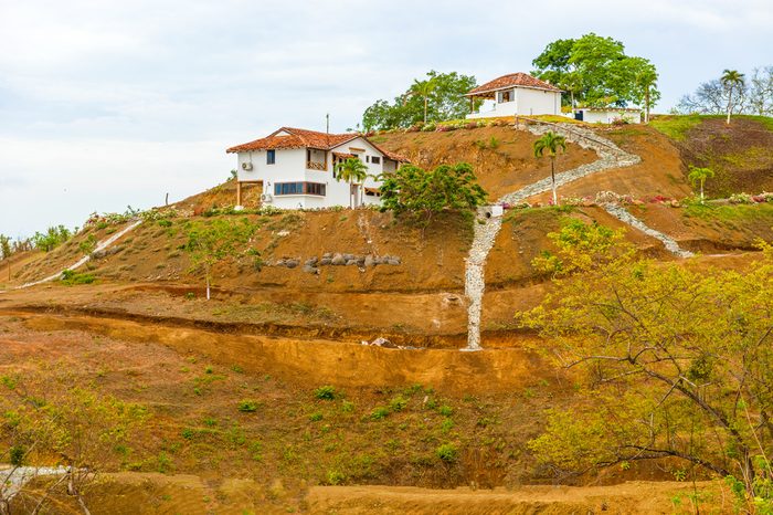Houses on the hill in the countryside near Pedasi on Azuero peninsula in Panama, Central America.