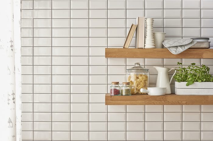 A collection of different ceramics complement a patterned tiles. For more inspiration. modern kitchenware new concept