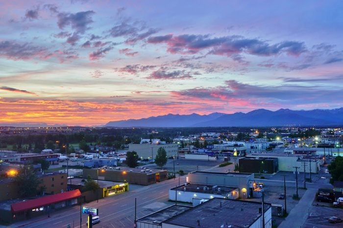 View of the Downtown Anchorage skyline in Alaska at sunset.