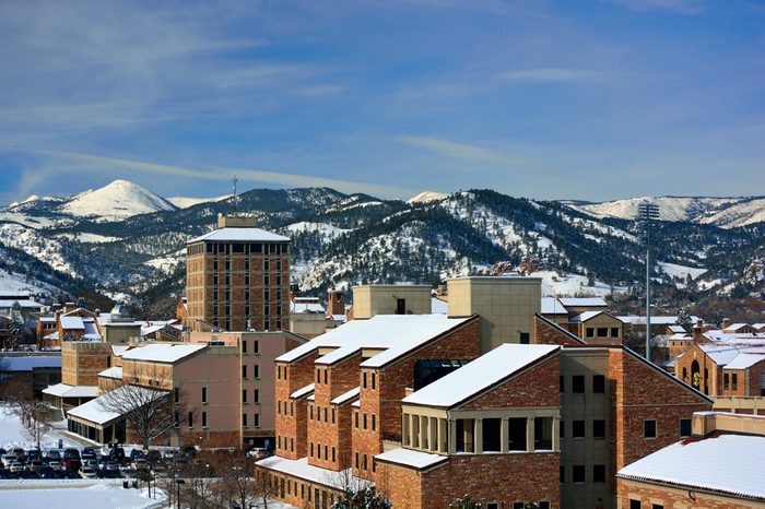 The University of Colorado Boulder Campus on a Snowy Winter Day with the Rocky Mountains in the Background