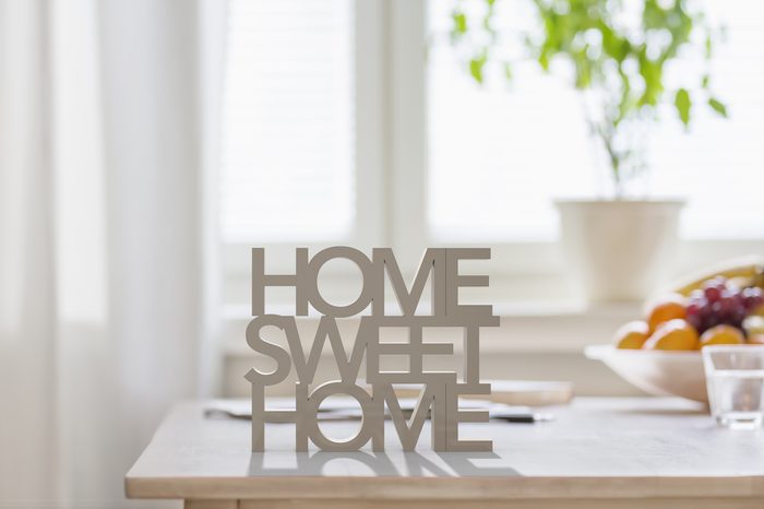 Table top with 3D letters making the words home sweet home