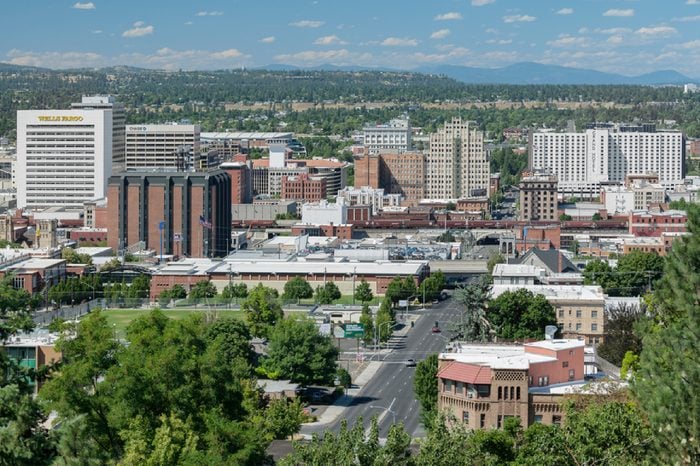 SPOKANE, WASHINGTON - JULY 23: Downtown Spokane from Edwidge Woldson Park on July 23, 2017 in Spokane, Washington